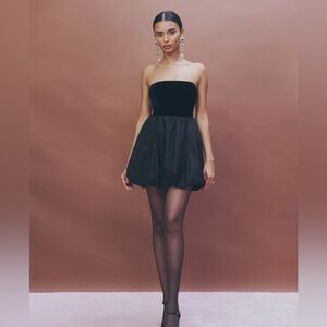 The St. Louis Velvet Dress is a mini dress from Reformation.